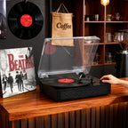 Tocadiscos portátil retro TE-2019 con altavoces integrados, modo ecualizador y grabación USB.
